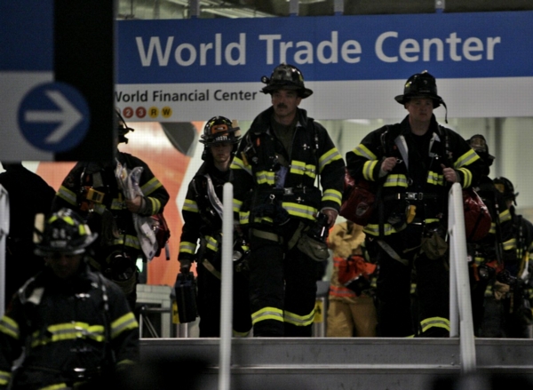 NEW YORK – Emergency responders proceed into the PATH train station during an emergency drill staged at the World Trade Center site on May 17, 2009 in New York City. The drill simulated an explosion involving a PATH commuter train in an underground tunnel between New York and New Jersey and involved more than 800 emergency services’ first responders. (Photo by Seth Wenig-Pool/Getty Images)