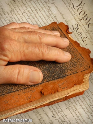 Hand_on_Bible